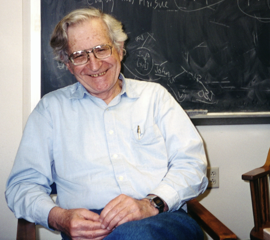 picture of Noam Chompsky in his office